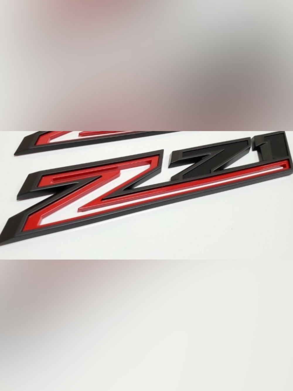 One 2019-2026 Chevy Silverado Z71 Emblem OEM Fender Black Red 84632695